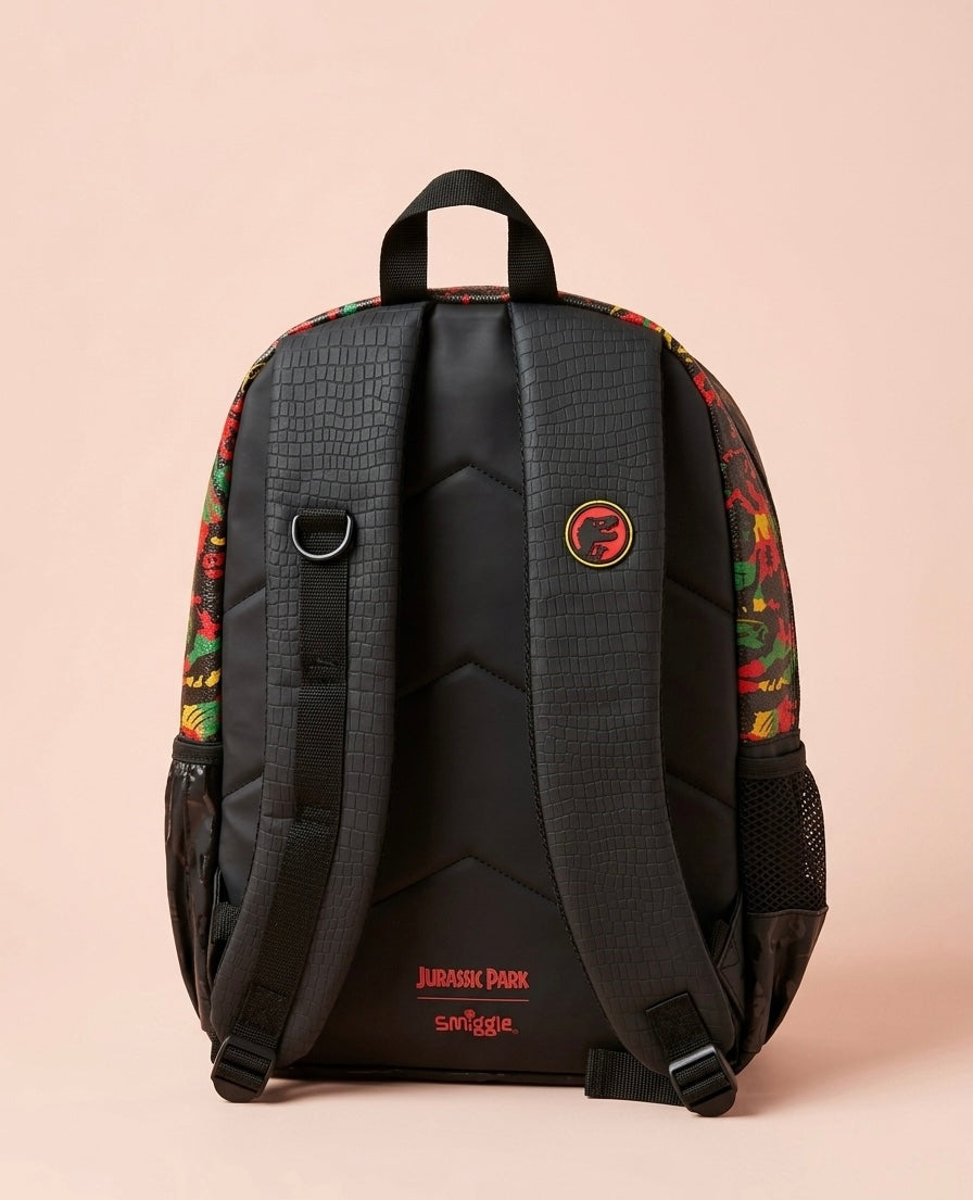 Jurassic Park x Smiggle Kids School Backpack – Rubber Logo Badge, Croc Texture Panel, Hazard Stripe & Dino All-Over Print, Multi-Compartment Bag for Boys Ages 5+, Black/Red/Yellow