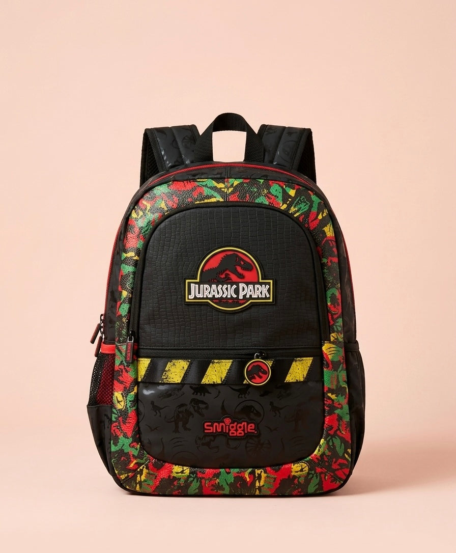 Jurassic Park x Smiggle Kids School Backpack – Rubber Logo Badge, Croc Texture Panel, Hazard Stripe & Dino All-Over Print, Multi-Compartment Bag for Boys Ages 5+, Black/Red/Yellow